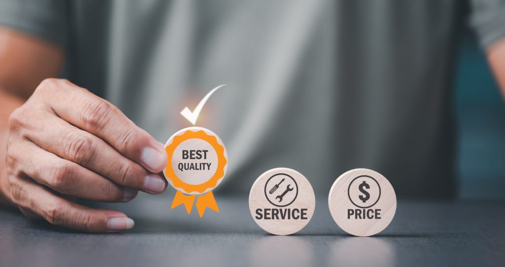 Young business owner holding circle wooden block in hand, best quality business idea, management and improvement of excellent products and services. to develop industry standards for success.
