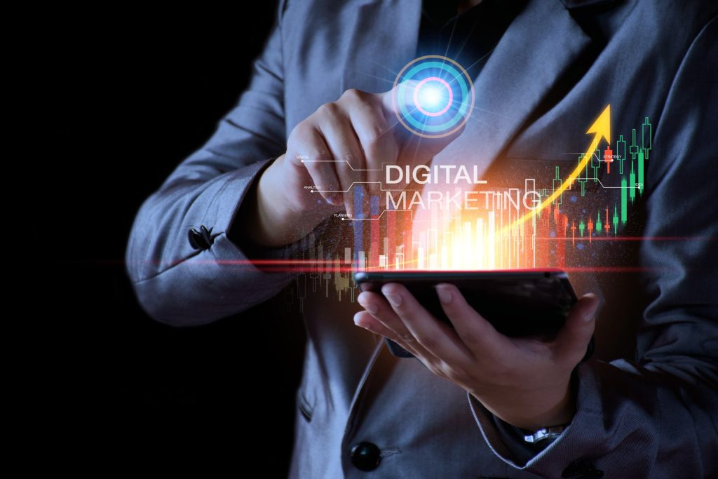 Digital marketing concept. Business man analyzing internet marketing online, business planning, online digital business, online stock market analysis, stock chart upward trend, digital stock trading.