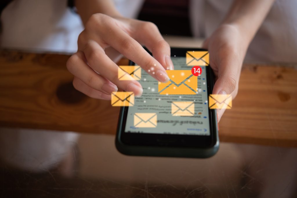 Woman using mobile smart phone email contact and message document media network digital internet send online information marketing.