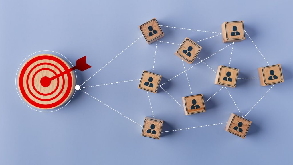 Target icon connection linkage with a human icon for customer focus target group and customer relation management concept.