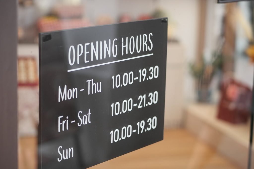 Open sign hanging front of café.
